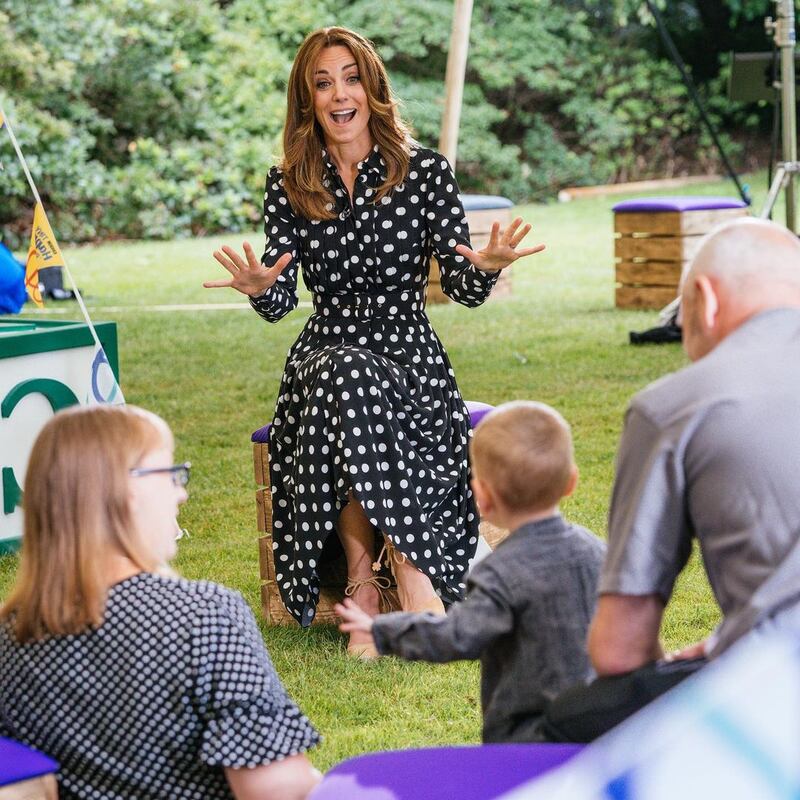 A departure from florals, the Duchess of Cambridge wears black and white Emilia Wickstead polka dots to launch the Tiny Happy People programme on July 13. Instagram / Kensington Royal