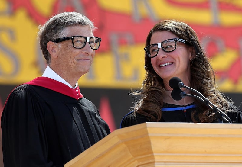 Bill Gates shares the stage with his wife Melinda during the 123rd Stanford commencement ceremony in Stanford, California. AFP