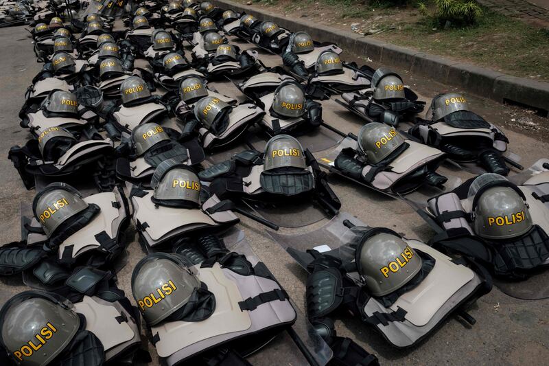 Police riot gear is placed on the ground in preparation, amid public protests against the recent presidential election results in Jakarta, Indonesia. AFP