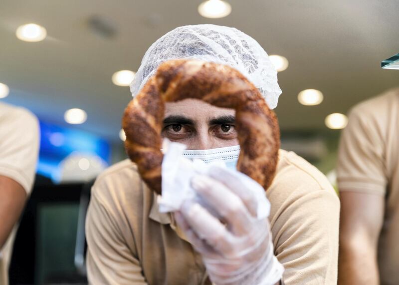 DUBAI, UNITED ARAB EMIRATES. 25 OCTOBER 2020. 
Turkish simit. Global Village celebrates it’s 25th season this year.
(Photo: Reem Mohammed/The National)

Reporter:
Section: