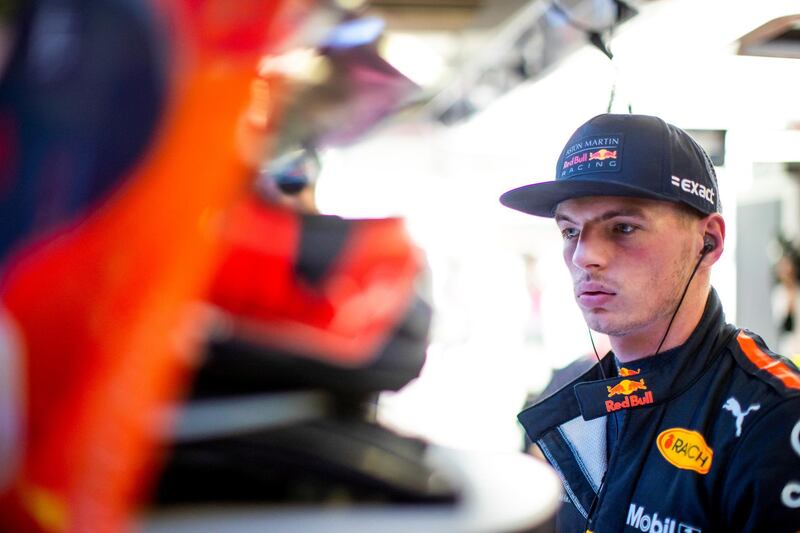 SUZUKA, JAPAN - OCTOBER 05:  Max Verstappen of Netherlands and Red Bull Racing prepares to drive in the garage during practice for the Formula One Grand Prix of Japan at Suzuka Circuit on October 5, 2018 in Suzuka.  (Photo by Mark Thompson/Getty Images)