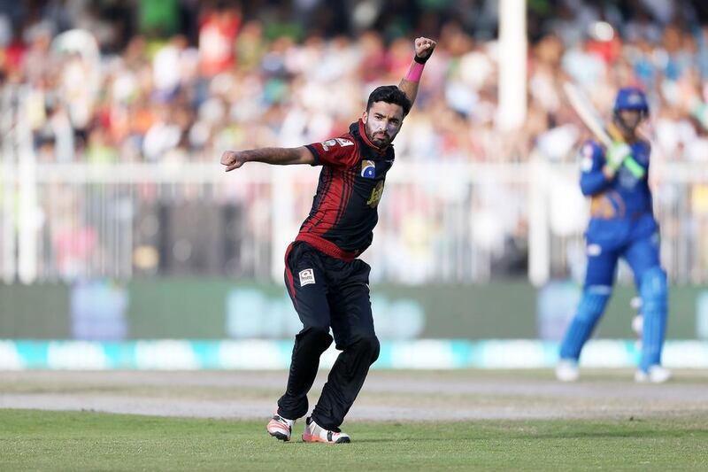 Zafar Gohar of Lahore Qalandars celebrating after taking the wicket of Shoaib Malik of Karachi Kings in the Pakistan Super League T20 match at Sharjah Cricket Stadium in Sharjah. ( Pawan Singh / The National )