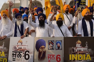 Activists from Dal Khalsa shout slogans as they take part in a protest march ahead of the anniversary of Operation Blue Star in Amritsar on June 5. AFP