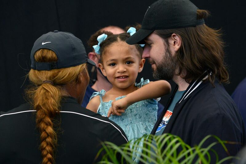 Serena Williams snd husband Alexis Ohanian talk to their daughter Alexis Olympia Ohanian Jr during the 'A Day at the Drive' exhibition tournament in Adelaide on Friday. AFP