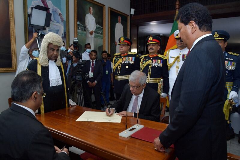 Ranil Wickremesinghe is sworn in as the new president of Sri Lanka by Chief Justice Jayantha Jayasuriya. Reuters