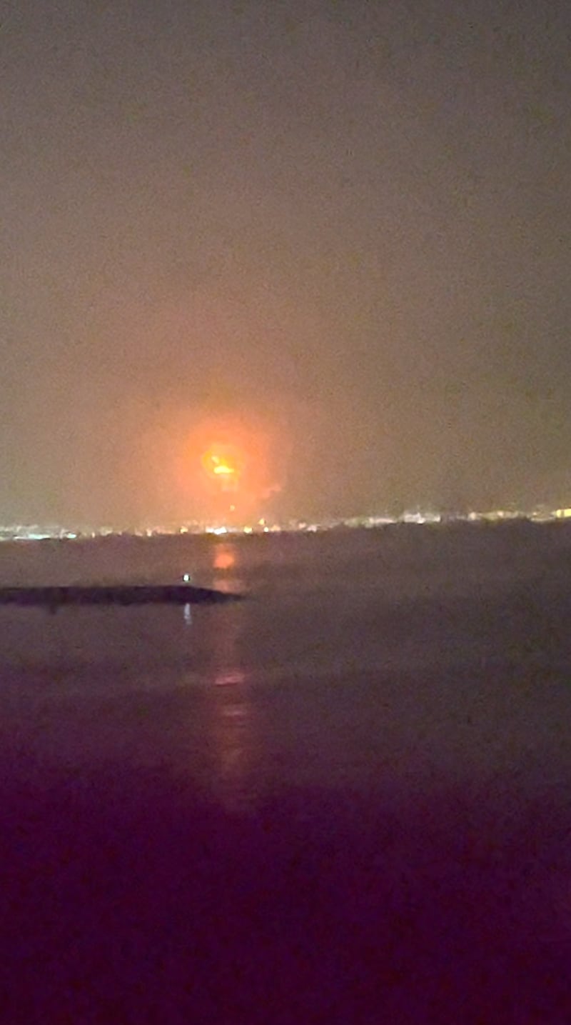 Fire caused by an explosion is seen in this still image taken from video obtained from social media.