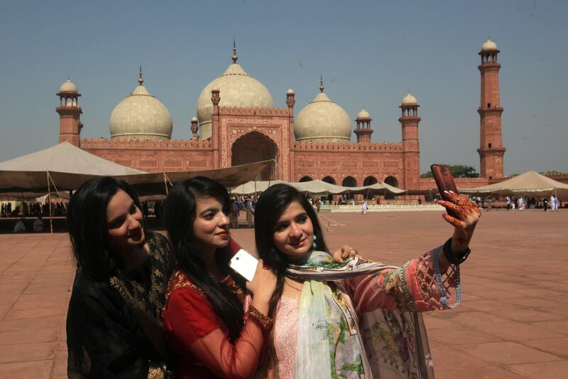 Girls take a selfie after attending Eid al-Fitr prayers, marking the end of Ramadan at the Badshahi Mosque in Lahore, Pakistan. Reuters