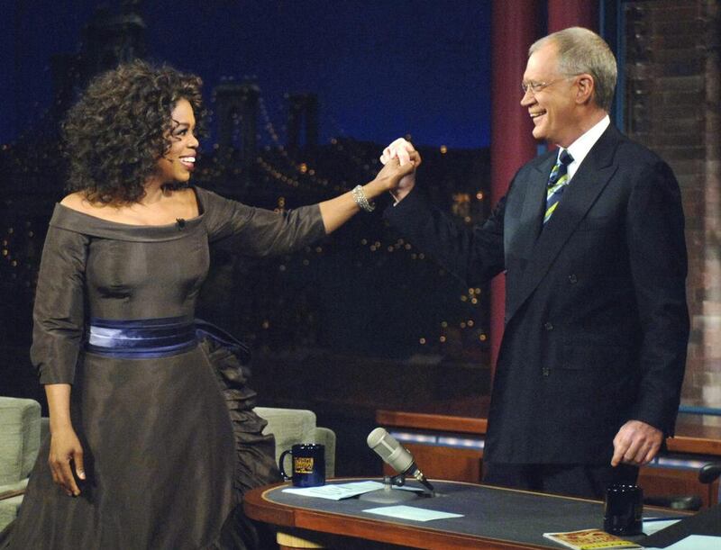 Oprah Winfrey appears with David Letterman. Following the interview, Dave escorted Oprah across 53rd street to the opening of her Broadway Show The Color Purple. AP