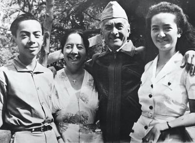 First president of the Philippines Manuel Quezon stands with his son, Manuel Jr., his wife, Dona, and his daughter, Maria. (Photo by Â© Hulton-Deutsch Collection/CORBIS/Corbis via Getty Images)