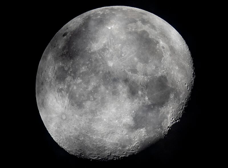 FILE - In this early Monday, Oct. 5, 2020, file photo, a waning moon is seen at the sky over Frankfurt, Germany. The European Space Agency, ESA, national counterparts and private companies are presenting their vision Thursday to put satellites in orbit around the moon, to make future missions to Earth's closest neighbor easier. (AP Photo/Michael Probst, File)