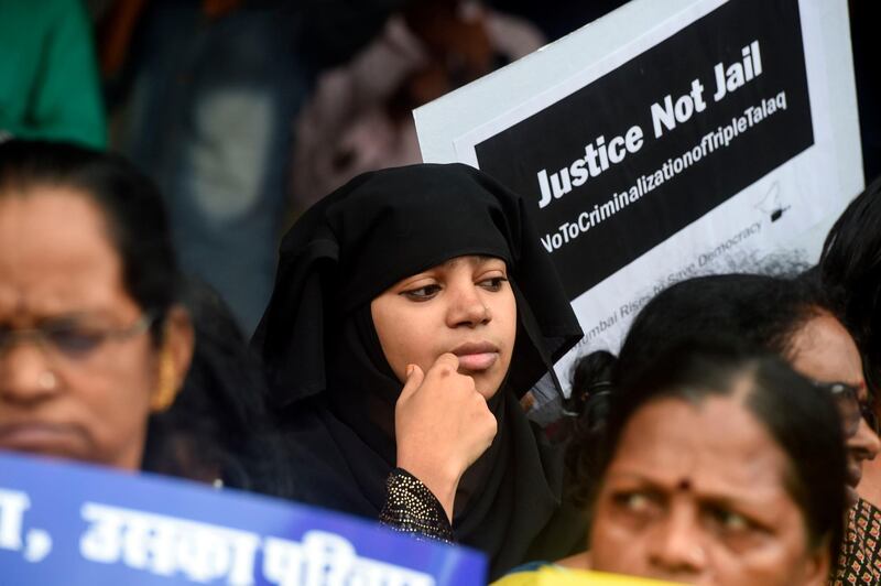 Women take part in a protest against the recent passage of a law to criminalise "instant divorce" for Muslims in Mumbai on August 1, 2019. The Indian government and women's groups hailed "historic" legislation July 31 that criminalised "instant divorce" for Muslims, but an influential Islamic group said it would launch a legal challenge.
 / AFP / PUNIT PARANJPE                      
