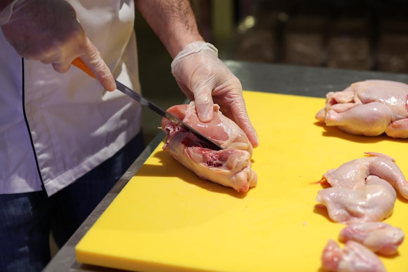 Michiel Smit. A group of South African pilots on unpaid leave for more than a year become specialist butchers at the Organic Cafe in Dubai on May 30th, 2021. Chris Whiteoak / The National. 
Reporter: Kelly Clark for News