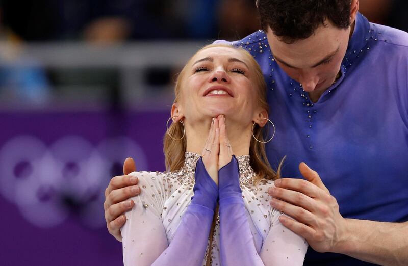 Gold medallists Aljona Savchenko and Bruno Massot of Germany react in the Pair Skating free skating competition final. Damir Sagolj / Reuters