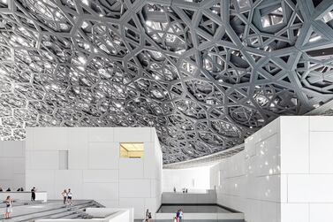  Jean Nouvel’s glistening dome is as much an attraction as what’s inside the museum.  Courtesy Louvre Abu Dhabi 