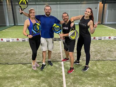 UAE TV presenter Katie Overy, right, with friends during her first padel experience. The sport is taking off in the UAE thanks to its sociability factor. Photo: Katie Overy