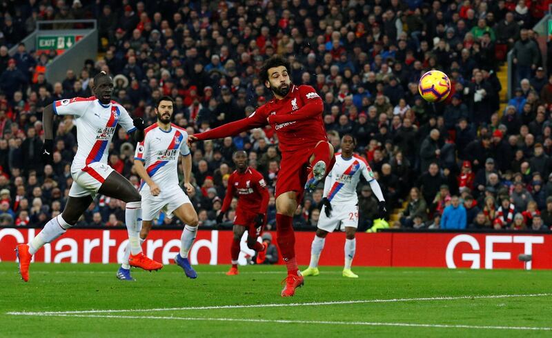 Liverpool's Mohamed Salah scores their first goal against Crystal Palace. Reuters