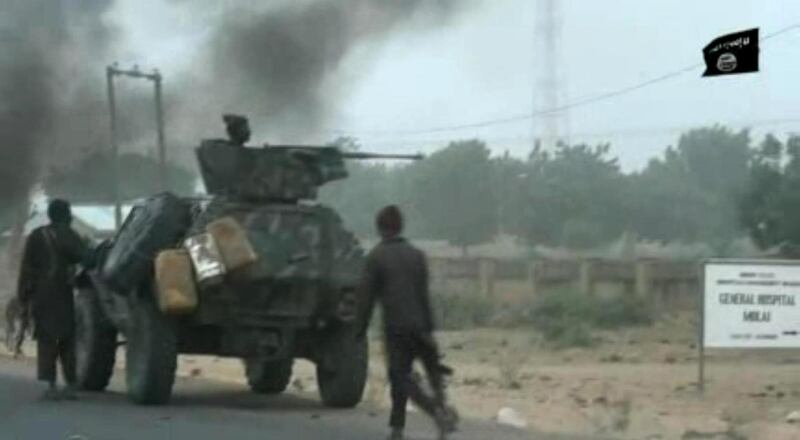 (FILES) This screen grab image taken from a video released on January 2, 2018 by Islamist group Boko Haram shows Boko Haram fighters during a Christmas Day attack on a military checkpoint in Molai village on the outskirts of the northeast Nigerian city of Maiduguri, which the military said was thwarted by troops after one hour of battle. Since early December jihadists disguised as soldiers had been setting up checkpoints to snare and abduct unsuspecting passengers. They appeared to focus on Christians, aid workers and military personnel. - RESTRICTED TO EDITORIAL USE - MANDATORY CREDIT "AFP PHOTO / BOKO HARAM" - NO MARKETING NO ADVERTISING CAMPAIGNS - DISTRIBUTED AS A SERVICE TO CLIENTS
 / AFP / BOKO HARAM / Handout / RESTRICTED TO EDITORIAL USE - MANDATORY CREDIT "AFP PHOTO / BOKO HARAM" - NO MARKETING NO ADVERTISING CAMPAIGNS - DISTRIBUTED AS A SERVICE TO CLIENTS
