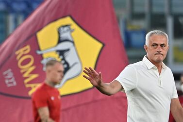 Roma's Portuguese coach Jose Mourinho greets supporters before the friendly football match between AS Roma and Casablanca at the Olympic stadium in Rome on August 14, 2021.  (Photo by Andreas SOLARO  /  AFP)