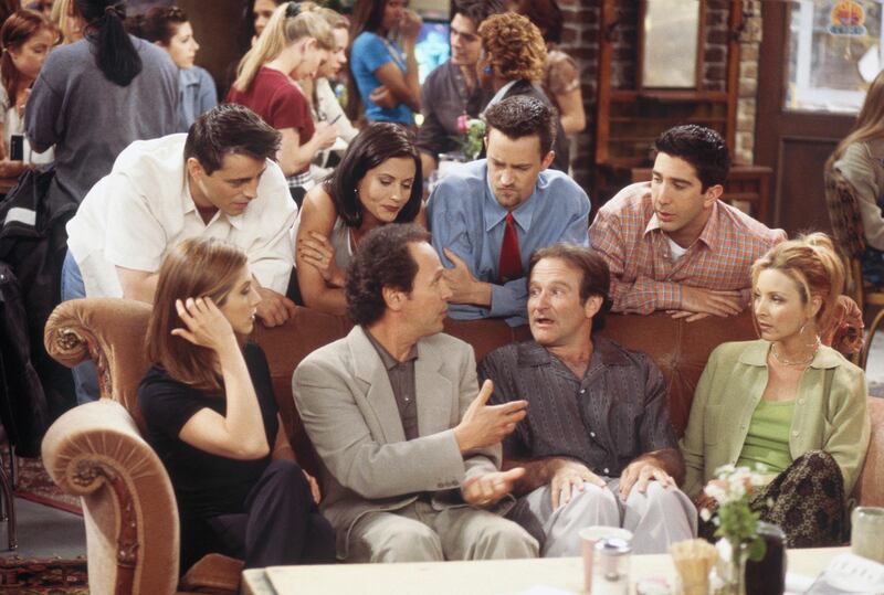 FRIENDS -- "The One with the Ultimate Fighting Champion" Episode 24 -- Pictured: (front, l-r) Jennifer Aniston as Rachel Green, Billy Crystal as Tim, Robin Williams as Thomas, Lisa Kudrow as Phoebe Buffay, (back, l-r) Matt LeBlanc as Joey Tribbiani, Courteney Cox as Monica Geller, Matthew Perry as Chandler Bing, David Schwimmer as Ross Geller  (Photo by Paul Drinkwater/NBCU Photo Bank/NBCUniversal via Getty Images via Getty Images)