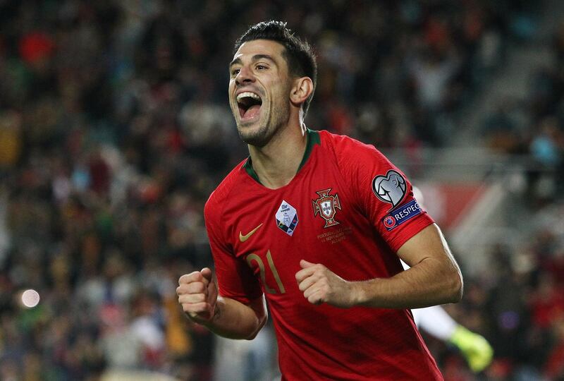 Portugal's Pizzi celebrates scoring his team's third goal. Reuters
