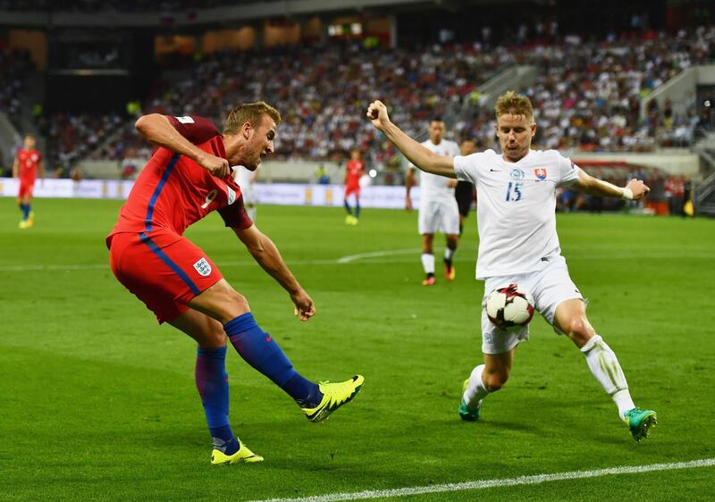 TRNAVA, SLOVAKIA - SEPTEMBER 04:  Harry Kane of England is blocked by Tomas Hubocan of Slovakia during the 2018 FIFA World Cup Group F qualifying match between Slovakia and England at City Arena on September 4, 2016 in Trnava, Slovakia.  (Photo by Dan Mullan/Getty Images)