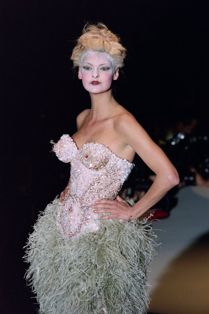 Linda Evangelista, the Canadian model, now 56, displays a creation at the Louvre Carrousel in March 1995, Paris. AFP
