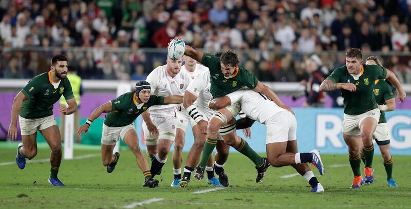 South Africa's Eben Etzebeth runs with the ball during the Rugby World Cup final. AP Photo