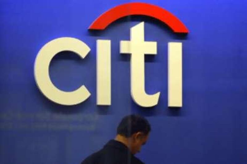 The US government has vowed to protect struggling banking giant Citigroup against "unusually large losses" and give it 20 billion dollars from a massive financial rescue package approved by Congress.