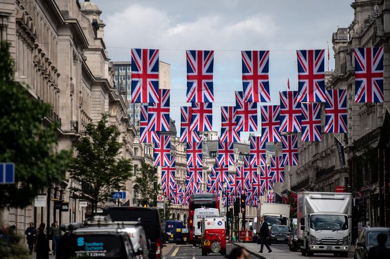 British Union flags on Regent Street in London celebrate the queen's platinum jubilee on June 1. The public holiday for the celebrations had a knock-on effect for the economy. Bloomberg