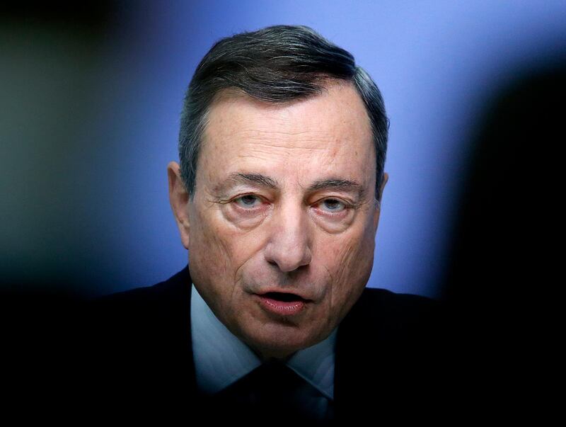 FILE - In this Thursday, Dec. 14, 2017 file photo, President of the European Central Bank Mario Draghi speaks during a news conference in Frankfurt, Germany. Draghi says it's too soon to declare victory over weak inflation â€” indicating it's too early to set a definite end date for the bank's money-printing stimulus despite a strengthening economy. (AP Photo/Michael Probst, file)