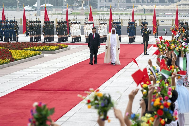 BEIJING, CHINA - July 22, 2019: HH Sheikh Mohamed bin Zayed Al Nahyan, Crown Prince of Abu Dhabi and Deputy Supreme Commander of the UAE Armed Forces (2nd L), attends a reception hosted by HE Xi Jinping, President of China (L), at the Great Hall of the People.

( Mohamed Al Hammadi / Ministry of Presidential Affairs )
---