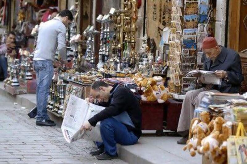 The unrest in Egypt has driven off tourists, affecting shop owners in the Khan al Khalili area of Cairo.