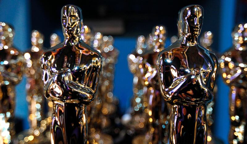 ** EMBARGOED AT THE REQUEST OF THE ACADEMY OF MOTION PICTURE ARTS & SCIENCES FOR USE UPON CONCLUSION OF THE ACADEMY AWARDS TELECAST ** Oscar statues are seen backstage during the 84th Academy Awards on Sunday, Feb. 26, 2012, in the Hollywood section of Los Angeles. (AP Photo/Chris Carlson)