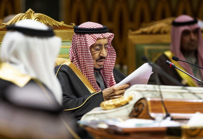 King Salman bin Abdulaziz reads notes. AFP / Saudi Royal Palace