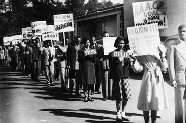 African-Americans protesting segregation in the US in 1950. A decade later, at issue was the ongoing quest of African-Americans not to be subjected to overt or barely concealed discrimination. Corbis