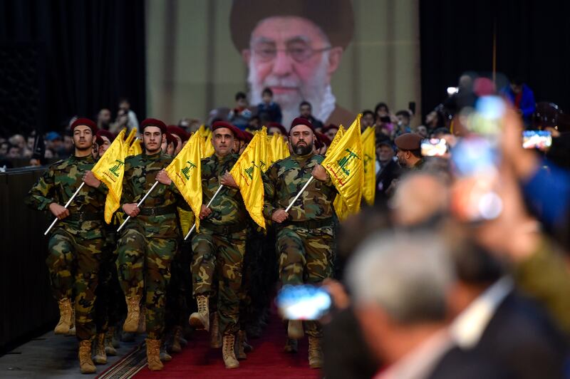 Hezbollah members during a gathering to commemorate Al Quds Day (Jerusalem Day) in a suburb outside Beirut, Lebanon.  EPA