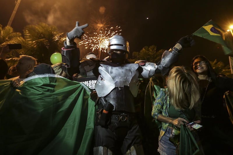 Supporters of Jair Bolsonaro celebrate his victory in Rio de Janeiro. EPA