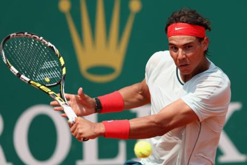 Rafael Nadal plays a backhand to Marinko Matosevic at the Monte Carlo Masters.