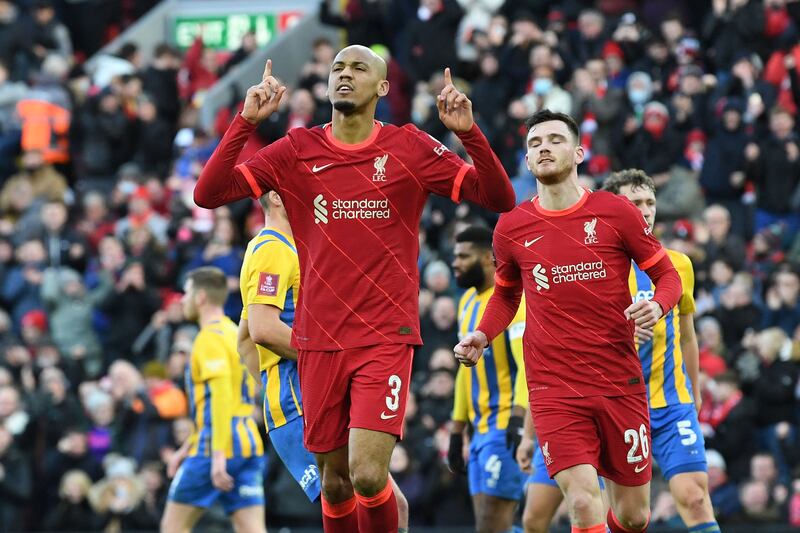 Fabinho celebrates scoring for Liverpool. AFP