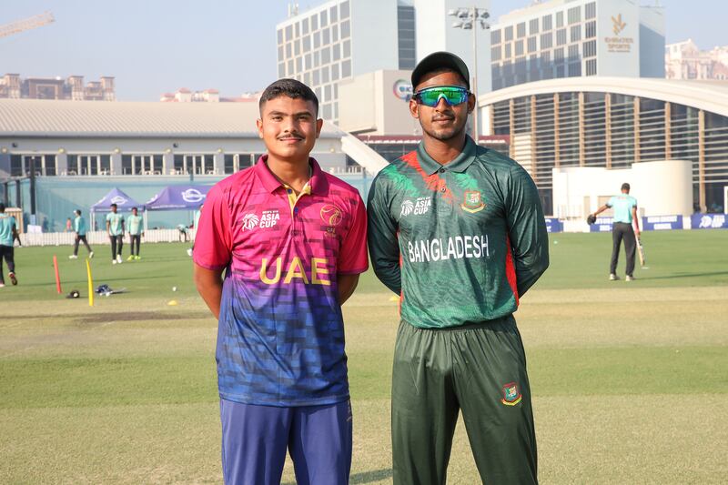 UAE captain Aayan Afzal Khan with Bangladesh skipper Mahfuzur Rahman  before the game. 
