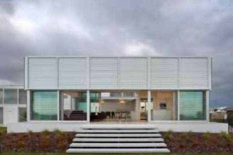 Exterior of a home in New Zealand designed by Julian Guthrie. Patrick Reynolds for The National