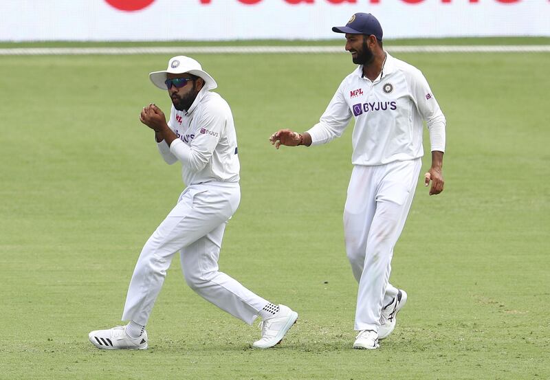 India fielder Rohit Sharma takes a catch to dismiss Australia's Cameron Green. AP