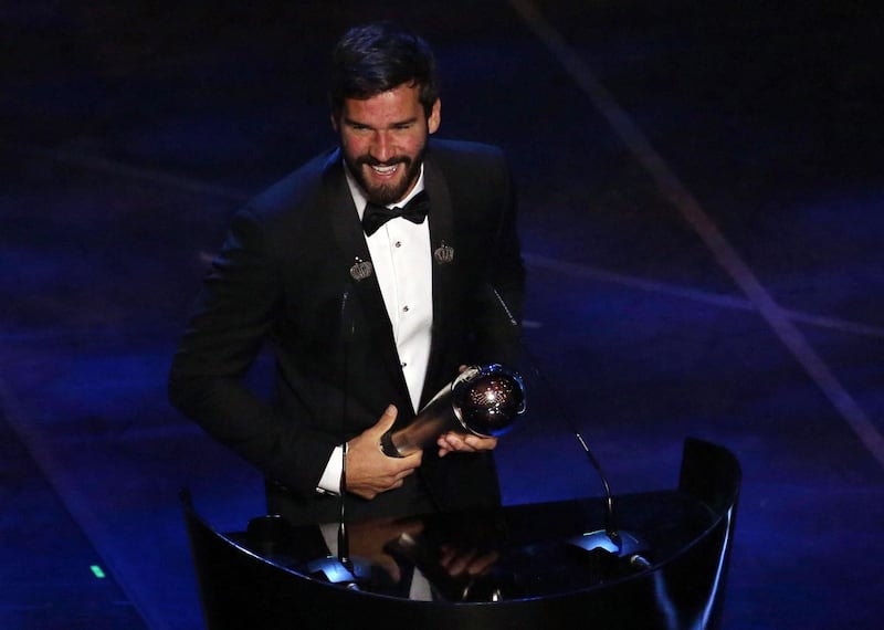 Liverpool's Alisson Becker of Brazil receives the Best FIFA Men's Goalkeeper award.  EPA