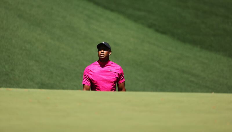 Tiger Woods  watches his ball on the 10th hole. EPA