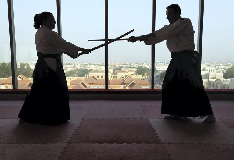 Dubai, United Arab Emirates - July 20, 2019: Cathy Darnell with Vladimir Bojovic. Cathy Darnell is the only female Aikido instructor in Dubai and is a 4th dan, she has the oldest dojo in the country, Zanshinkan Aikido club Dubai is celebrating our 25th anniversary in 2020. Saturday the 20th of July 2019. Al Barsha, Dubai. Chris Whiteoak / The National