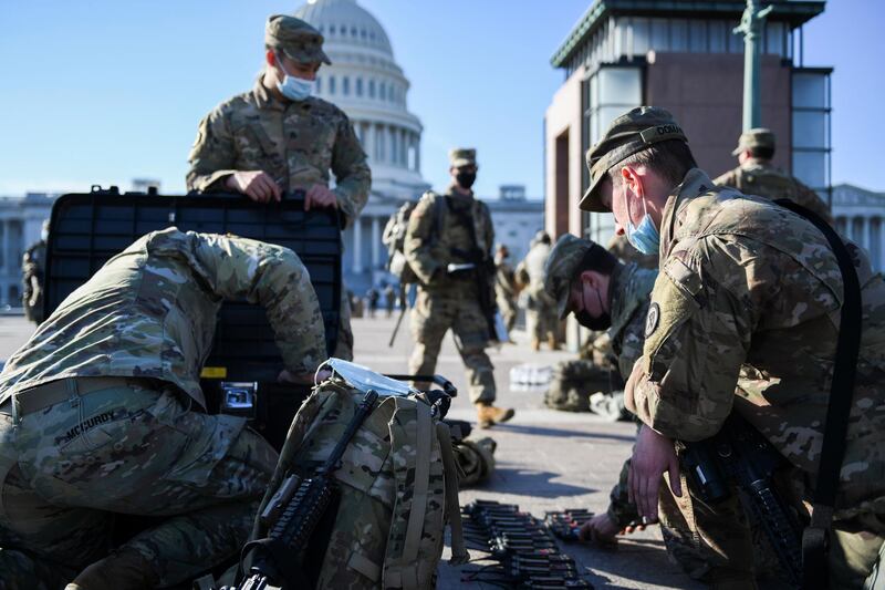 National Guard members deploy on US Capitol grounds in Washington, DC. Reuters