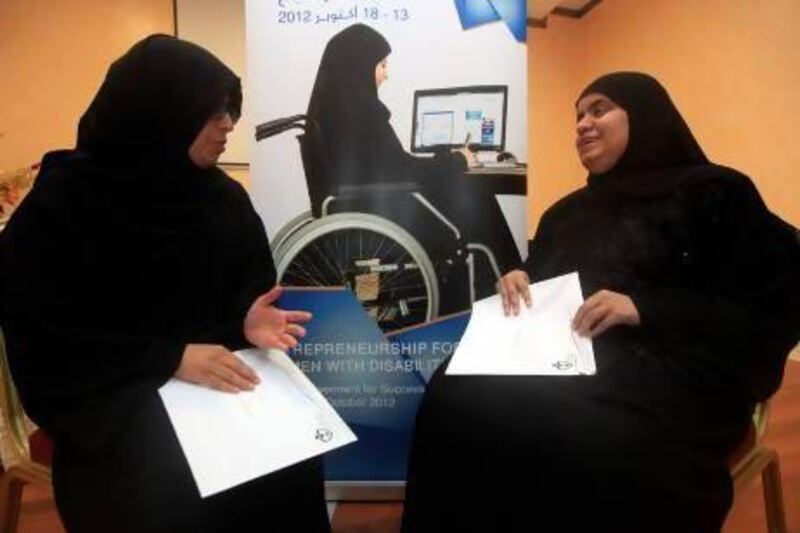Shaikha Shariqi (L) and Awatif Akbari (R) were winners of 'Entrepreneurship for Women with Disabilities' workshop organised by the Sharjah City for Humanitarian Services in partnership with the US Embassy at the Supreme Council for Family Affairs in Sharjah. Satish Kumar / The National