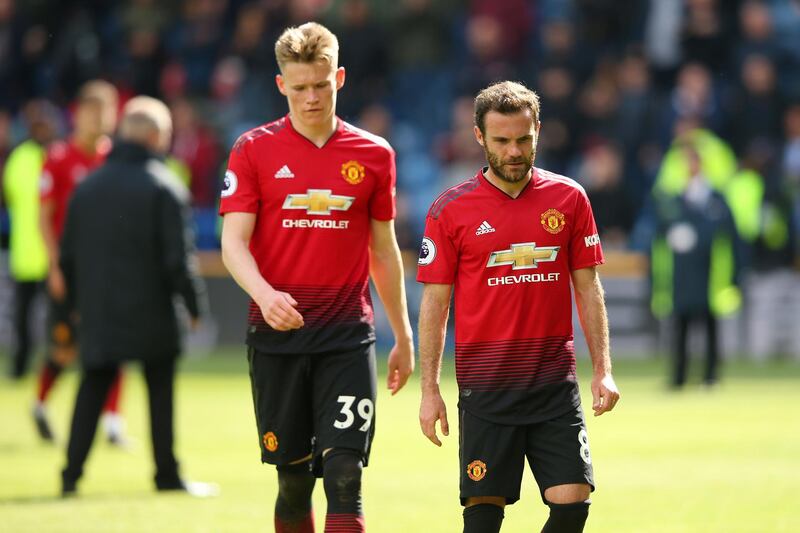 HUDDERSFIELD, ENGLAND - MAY 05:  Juan Mata and Scott McTominay of Manchester United react after the Premier League match between Huddersfield Town and Manchester United at John Smith's Stadium on May 05, 2019 in Huddersfield, United Kingdom. (Photo by Alex Livesey/Getty Images)