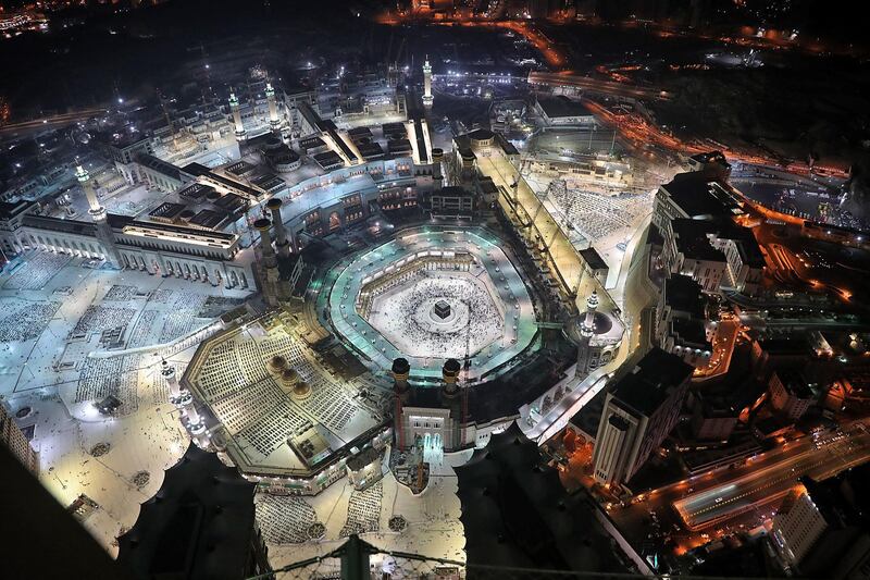 This picture taken during the Muslim holy fasting month of Ramadan, from the Mecca Royal Clock Tower of the Abraj al-Bait skyscraper complex, shows an aerial view of Muslim worshippers around the Kaaba (unseen), the holiest shrine in the Grand Mosque complex in Saudi Arabia's holy city of Mecca.  AFP