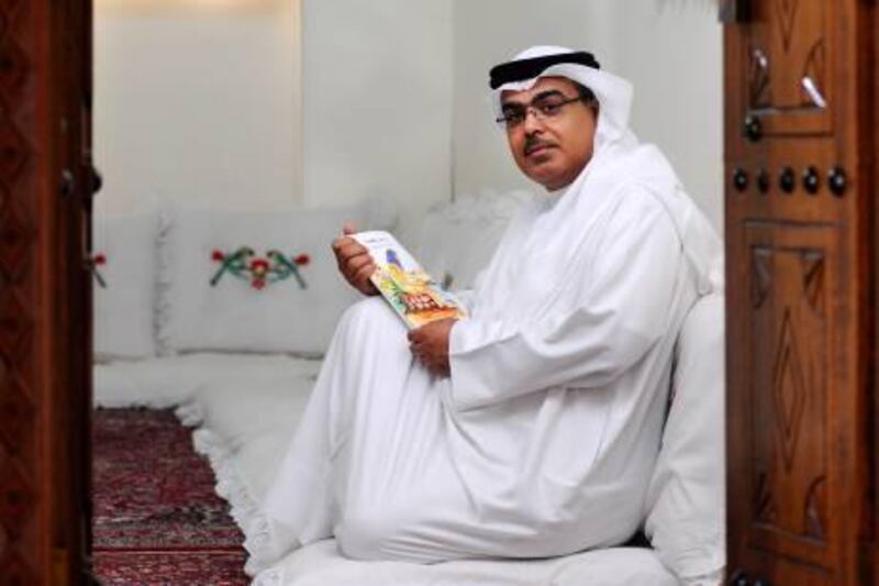 Abdulaziz Al Musallam, Director of Heritage & Culture of the emirate of Sharjah, photographed with his new book "Badiha" at Bait Al Garbi in the Heritage area of Sharjah on Wednesday, June 22, 2011. Photo: Charles Crowell for The National